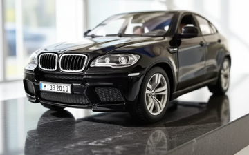 Pre-Owned Kyosho 1:18 BMW X6M Die-Cast Model SUV – Black with Silver Wheels